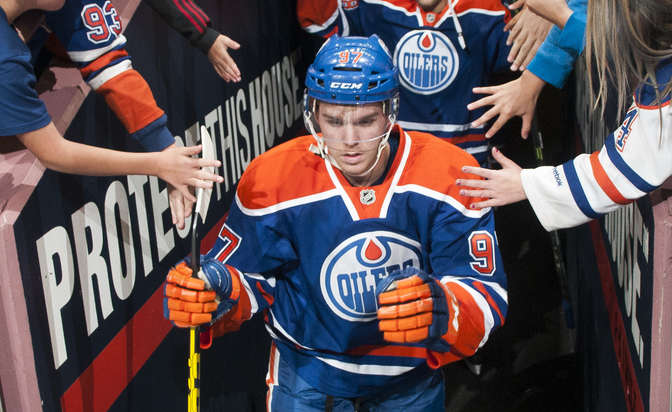 EDMONTON, AB - SEPTEMBER 21: Connor McDavid #97 of the Edmonton Oilers makes his way to the ice prior to a preseason game against the Calgary Flames on September 21, 2015 at Rexall Place in Edmonton, Alberta, Canada. (Photo by Andy Devlin/NHLI via Getty Images)
