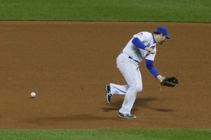 Oct 31, 2015; New York City, NY, USA; New York Mets second baseman Daniel Murphy commits a fielding error on a ball hit by Kansas City Royals first baseman Eric Hosmer (not pictured) in the 8th inning in game four of the World Series at Citi Field. Mandatory Credit: Noah K. Murray-USA TODAY Sports ORG XMIT: USATSI-245846 ORIG FILE ID: 20151031_jla_bm3_203.jpg
