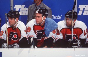 23 APR 1995: PHILADELPHIA FLYERS "LEGION OF DOOM" LINE, LEFT TO RIGHT: JOHN LECLAIR, ERIC LINDROS, MIKAEL RENBERG, ON THE BENCH DURING A 4-2 LOSS TO THE BUFFALO SABRES AT THE MEMORIAL AUDITORIUM IN BUFFALO, NEW YORK. Mandatory Credit: Harry Scull/ALLSPOR