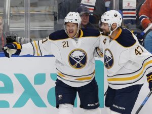 Oct 16, 2016; Edmonton, Alberta, CAN; Buffalo Sabres forward Kyle Okposo (21) celebrates a first period gaol against the Edmonton Oilers at Rogers Place. Mandatory Credit: Perry Nelson-USA TODAY Sports